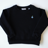 Softly garment-dyed black organic cotton children's sweatshirt with a subtle blueberry embroidery, offering a cozy vintage feel, sustainably made in the USA, from Colorful Bunch's conscious fashion collection for kids.