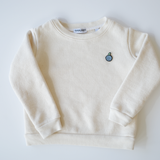 Undyed, organic cotton children's crewneck sweatshirt with an embroidered blueberry design, grown and milled in the USA and crafted by Colorful Bunch with local manufacturing.