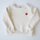 Unbleached, pure organic cotton children's sweater showcasing a sweet strawberry embroidery, sourced and crafted in the USA, part of Colorful Bunch's eco-friendly apparel collection for kids.