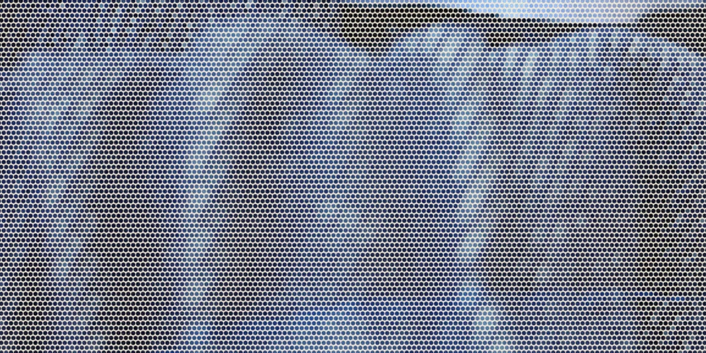 Close-up of gathered elastic waistband fabric in cotton kids jeans; a bold Paper halftone photo treatment