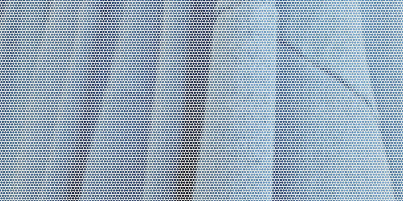 Garment-dyed blue cotton sleeves hanging in a row; a bold Paper halftone photo treatment