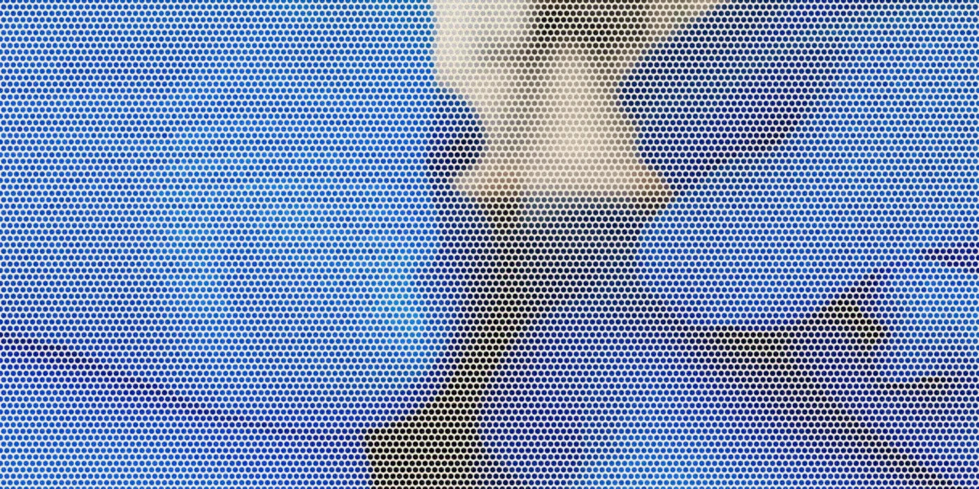 Blue cotton pullovers folded on a wooden shelf; a bold Paper halftone photo treatment