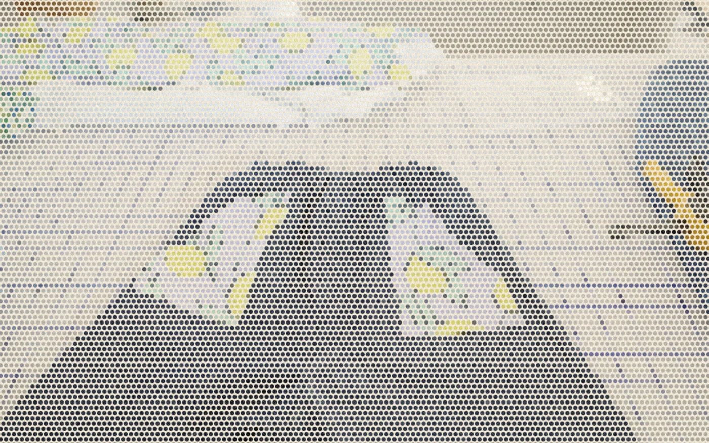 Elastic-waist jeans, printed fabric and tools on a gridded sewing table; a bold Paper halftone photo treatment