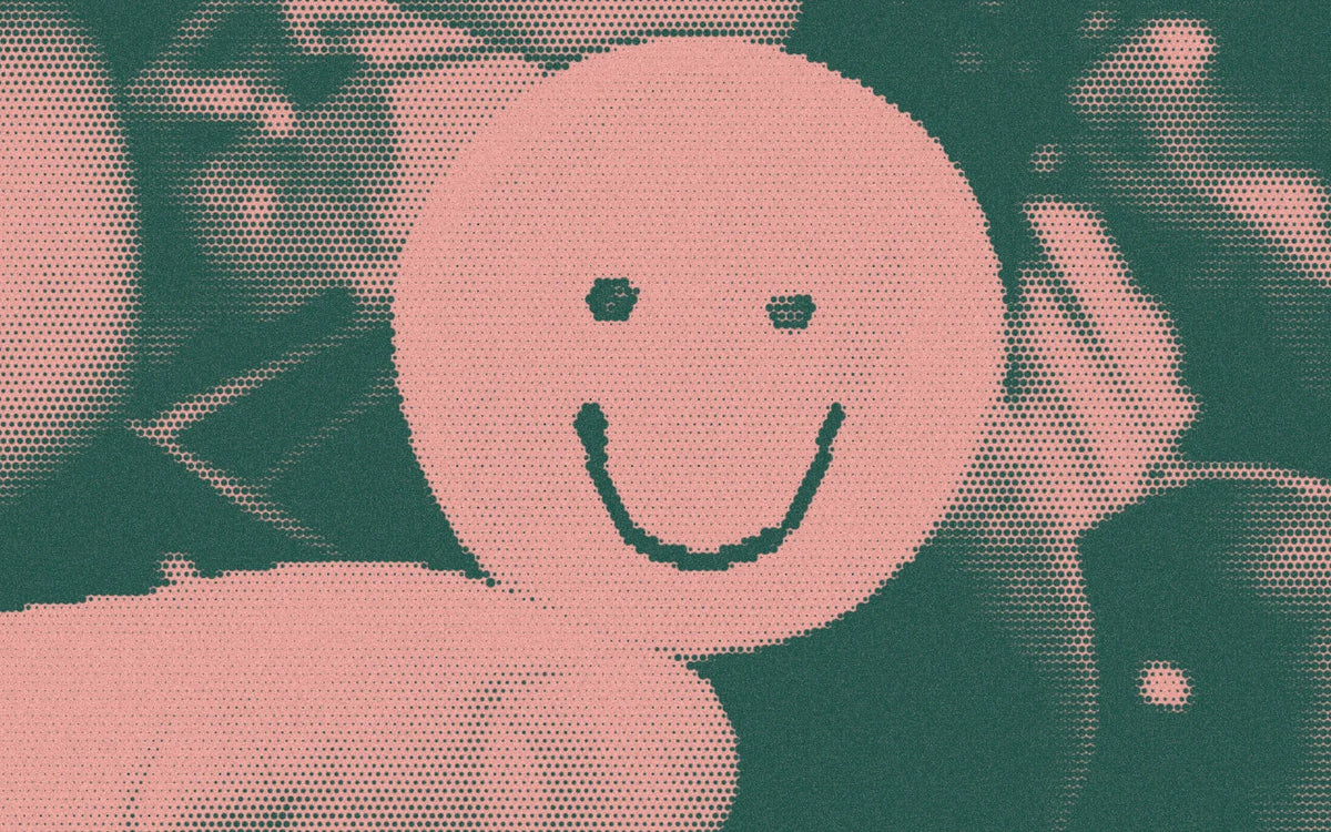 Smiley ceramic magnet held in front of leaves, with a bold halftone treatment