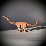 Apatosaurus wooden toy with flexible neck and tail