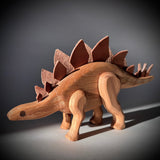 Stegosaurus wooden toy with leather plates and magnetic joints