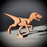 Velociraptor wooden toy with magnetic joints by The Serious Toy Company
