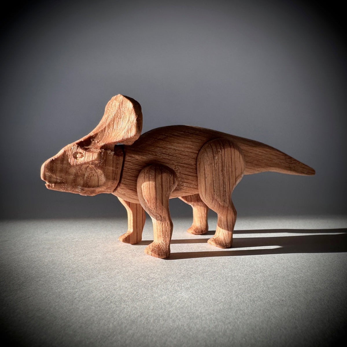 Protoceratops wooden toy with magnetic joints