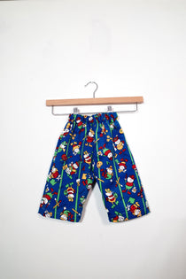 Kids’ pull-on pants in art club blue, shown hanging from a wooden hanger.