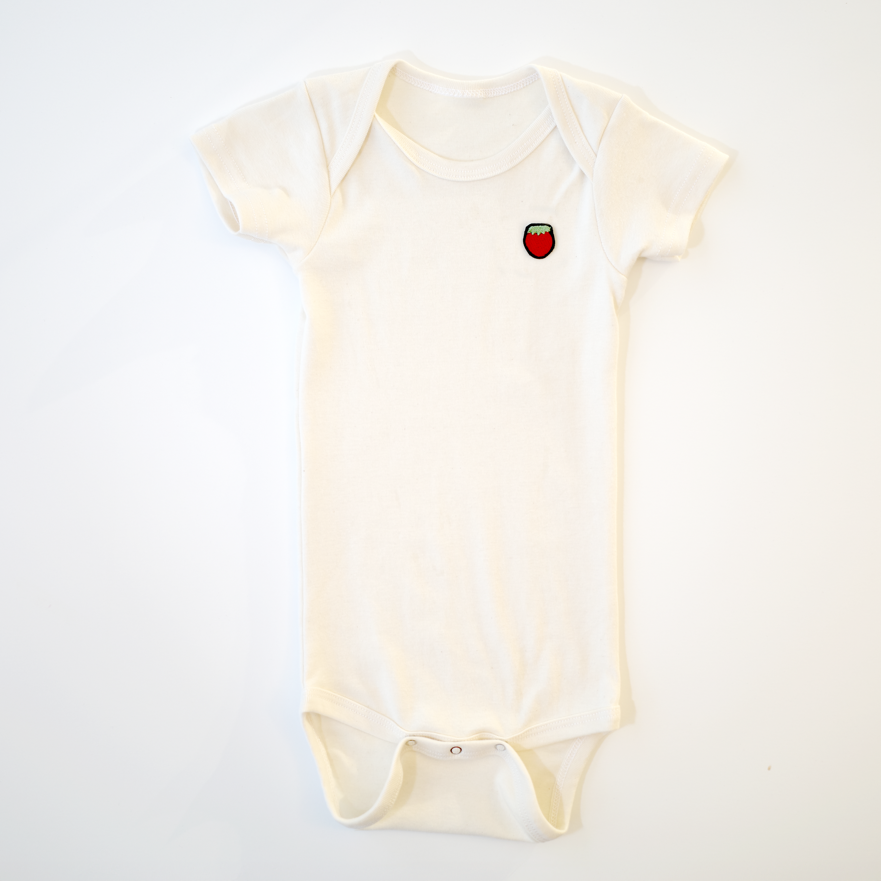 The Everyday Short-Sleeve Bodysuit in Natural White